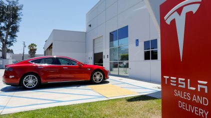 FILE PHOTO: A Tesla Sales And Service Center Is Shown In Costa Mesa, California
