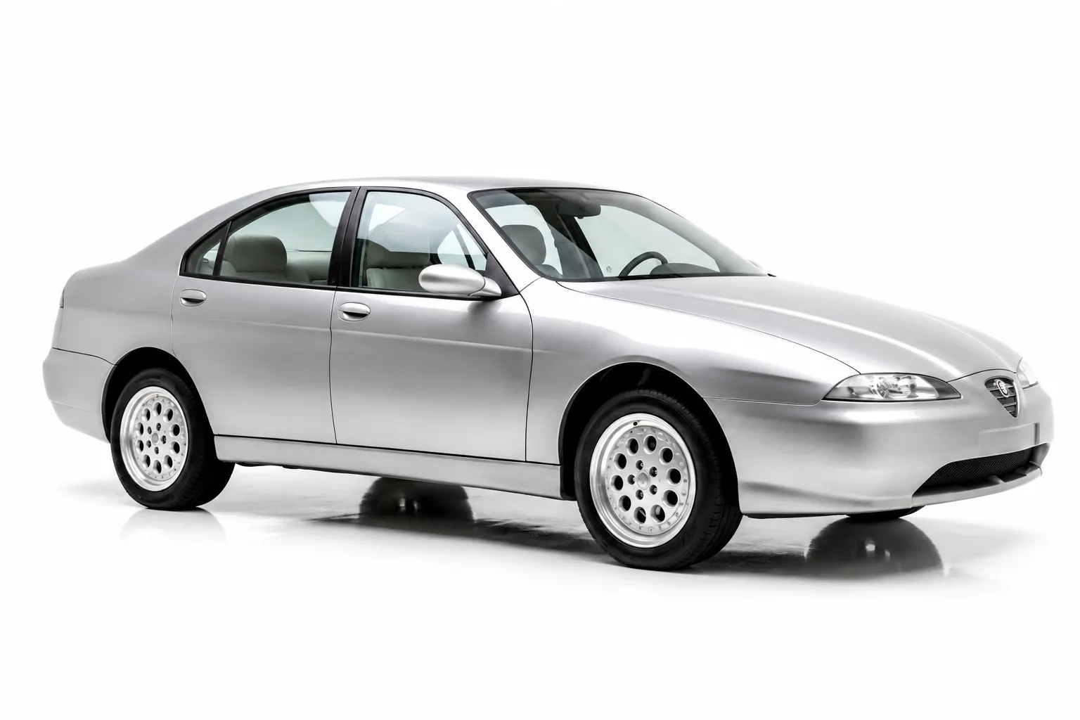Alfa Romeo 166 y la maqueta perdida de Bertone: los secretos de la berlina que nació de un concurso secreto
